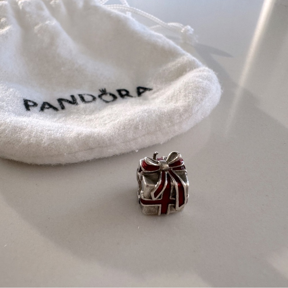 Pandora Christmas gift charm with red bow